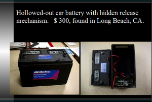 Image of Hollowed out car battery with hidden release mechanism.